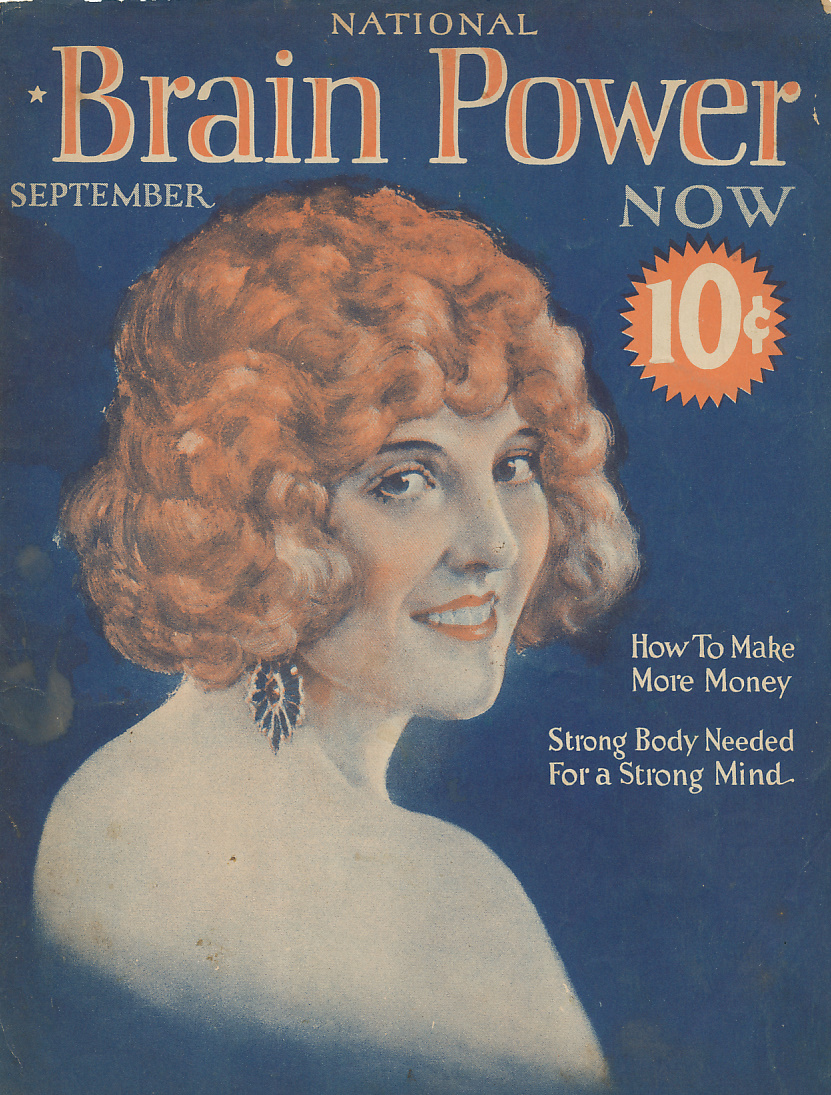 Cover of National Brain Power magazine. It depicts a smiling woman with short curly red hair.